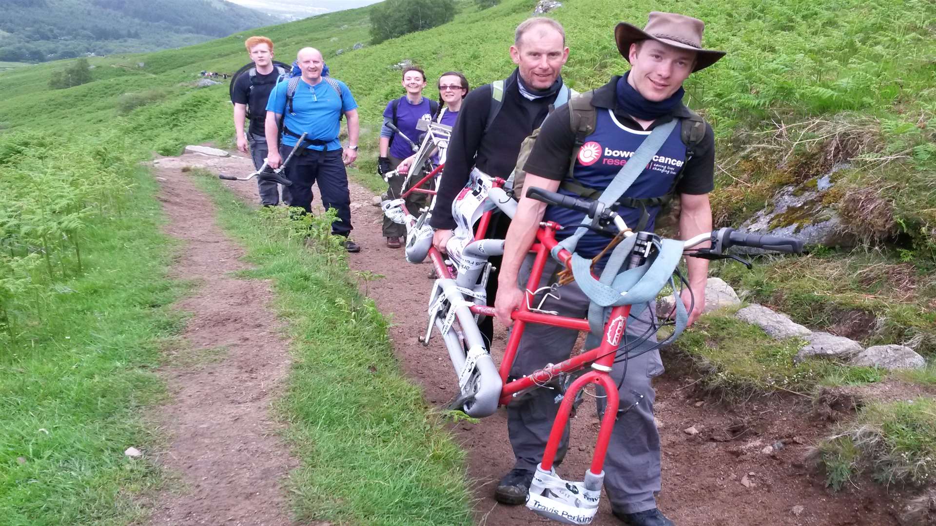 They stripped the bike down to carry it up the mountain.