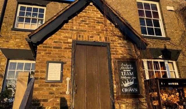 This heavy wooden door is the main entrance and it’s safely tucked away on the right hand side of the pub