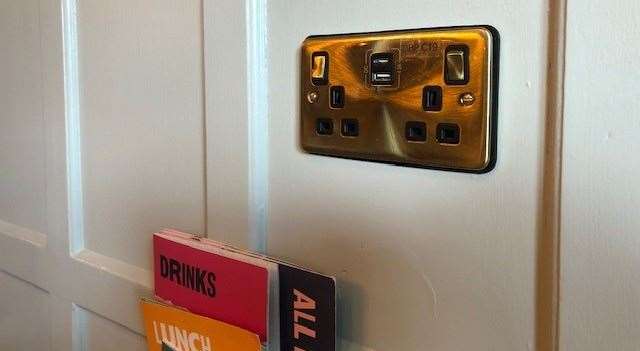 There are sockets with USB charging points at the tables in the dining area.