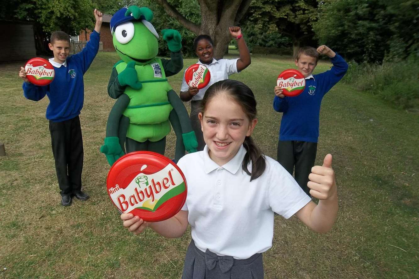 Buster Bug, the walk to school mascot, joins Park Way Primary School pupils Selin Ibrahimova, 10, (front) and Tyrece Knight, Zanele Moyo, and Aiden Lambert, all 11, to promote the school's road safety week