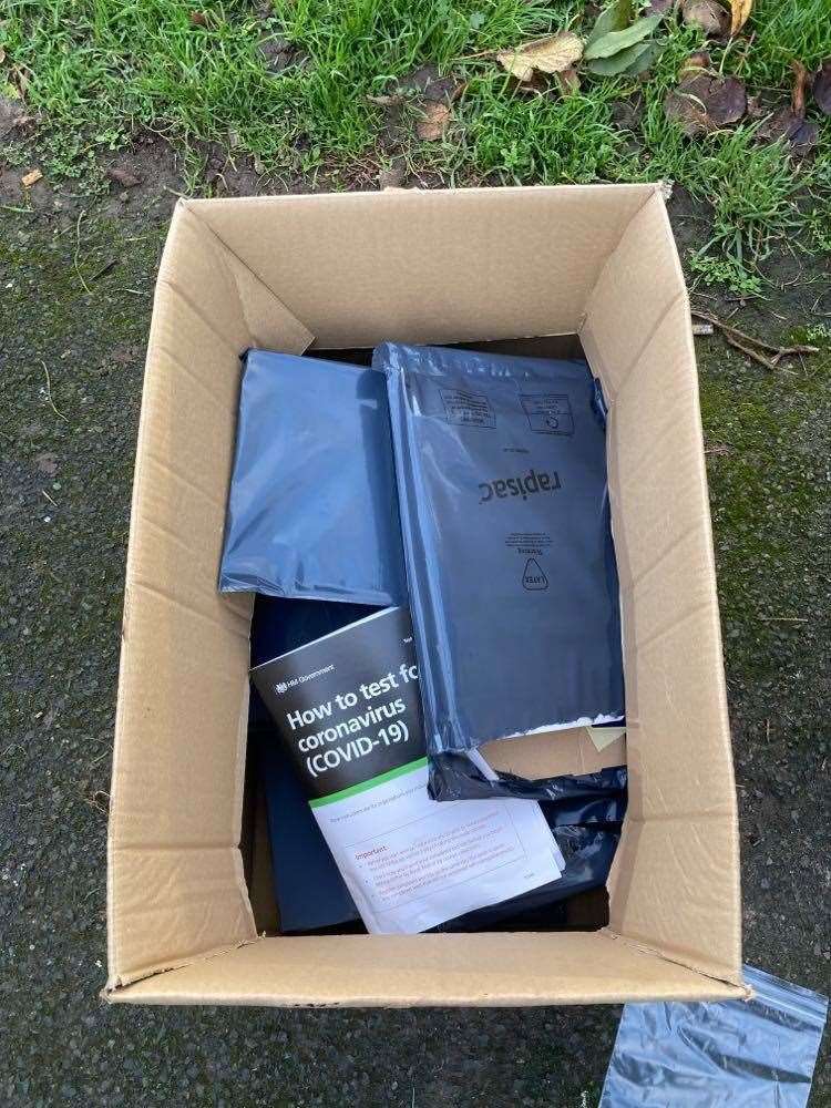 The box of Covid-19 testing kits found in Dane Park