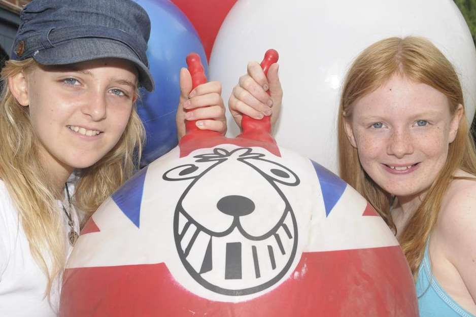 Adhradh Rooney, 13 and 11-year-old Natasha Birks taking part in space hopper filming