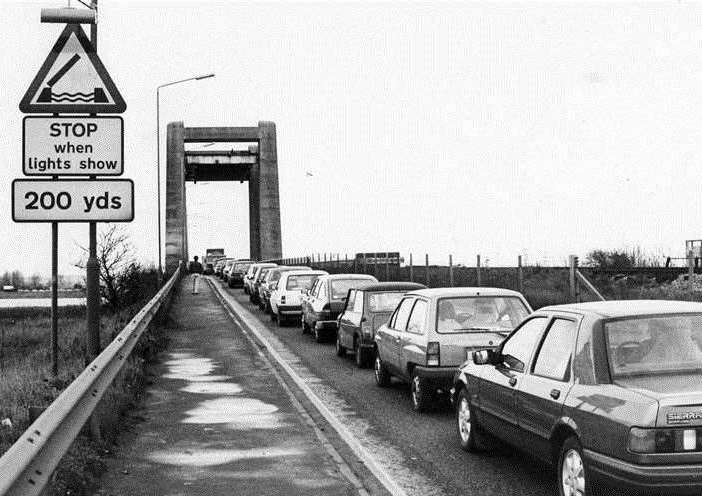 Cars queuing to get on Sheppey during a lift of the Kingsferry Bridge in March 1989