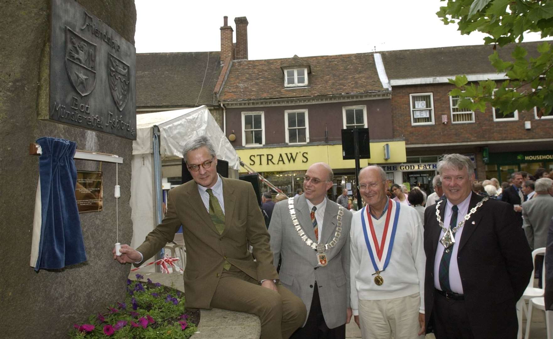 A plaque is unveiled on Ashford's friendship rock in the Lower High Street in 2003. The rock commemorates the twin links between Ashford and Bad Münstereifel