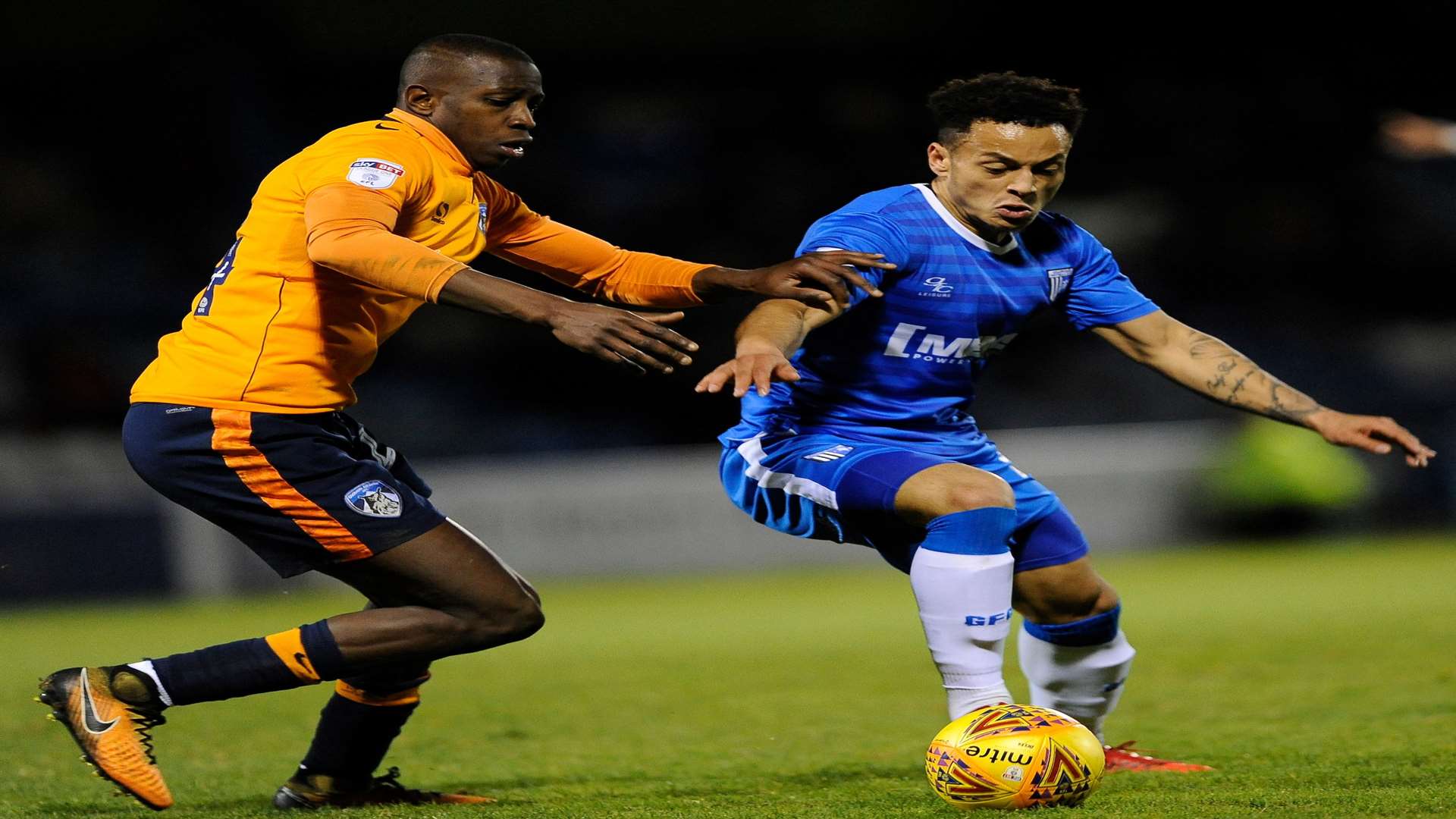 Elliott List holds off Oldham's Ousmane Fane Picture: Ady Kerry