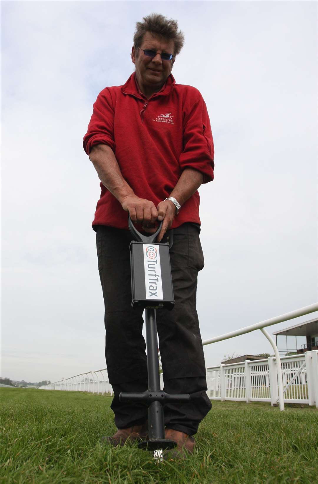 Nigel Barton, groundsman, checks the turf with a Turftrax meter in May 2009. Picture: Chris Denham