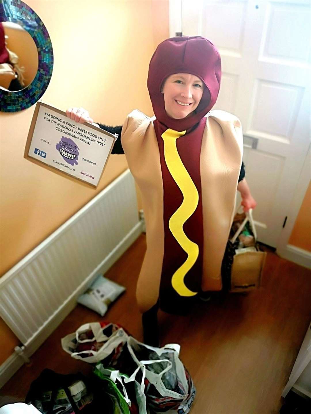 Laura has been doing her weekly shop in fancy dress to raise money for a national coronavirus appeal. Picture: Laura Winter