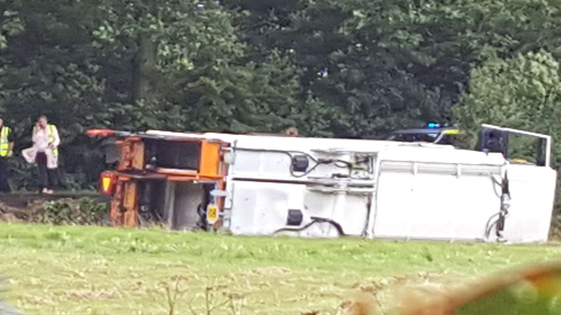 The bin lorry toppled into a field