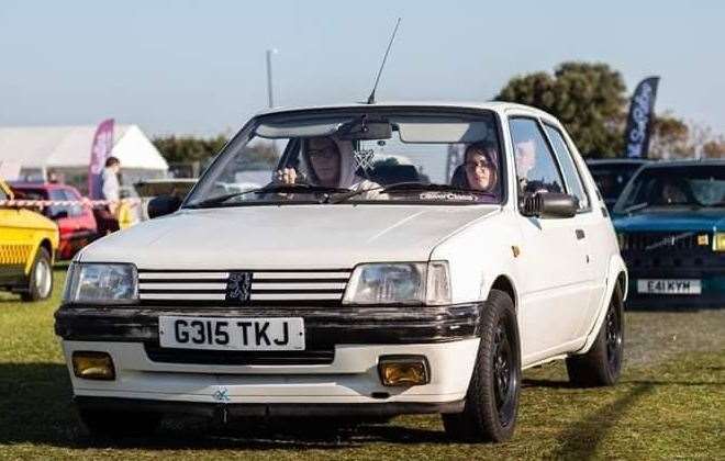The same Peugeot 205 pictured at a car show before the arson attack