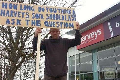 Ian Hayden from Paddock Wood and his protest outside Harvey's furniture store in Aylesford