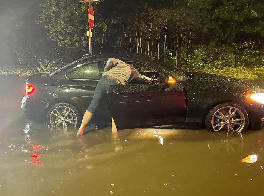 Drivers were stranded after torrential rain flooded the M26 at Wrotham last night. Photo: UKNIP