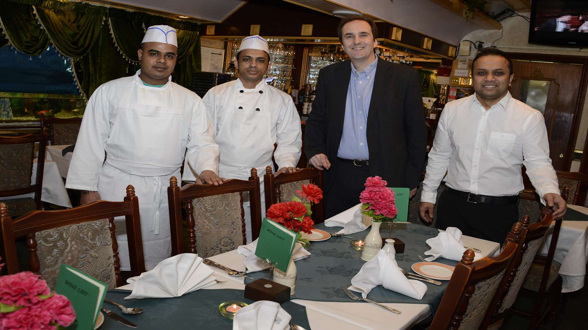 New owner Ian Sleeper with staff Abu Sayem, Ali Liakat and Miah Sabul