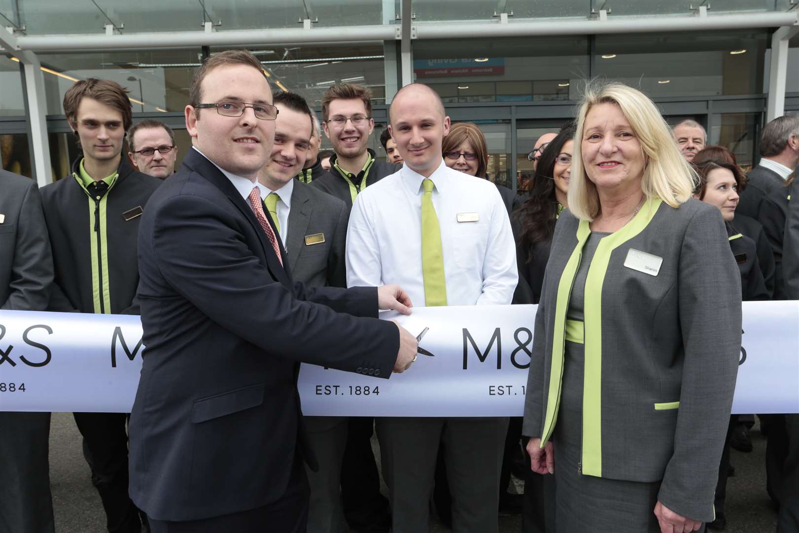 Ryan Clarke and Sharon Stanard officially open the new store. Picture: Martin Apps