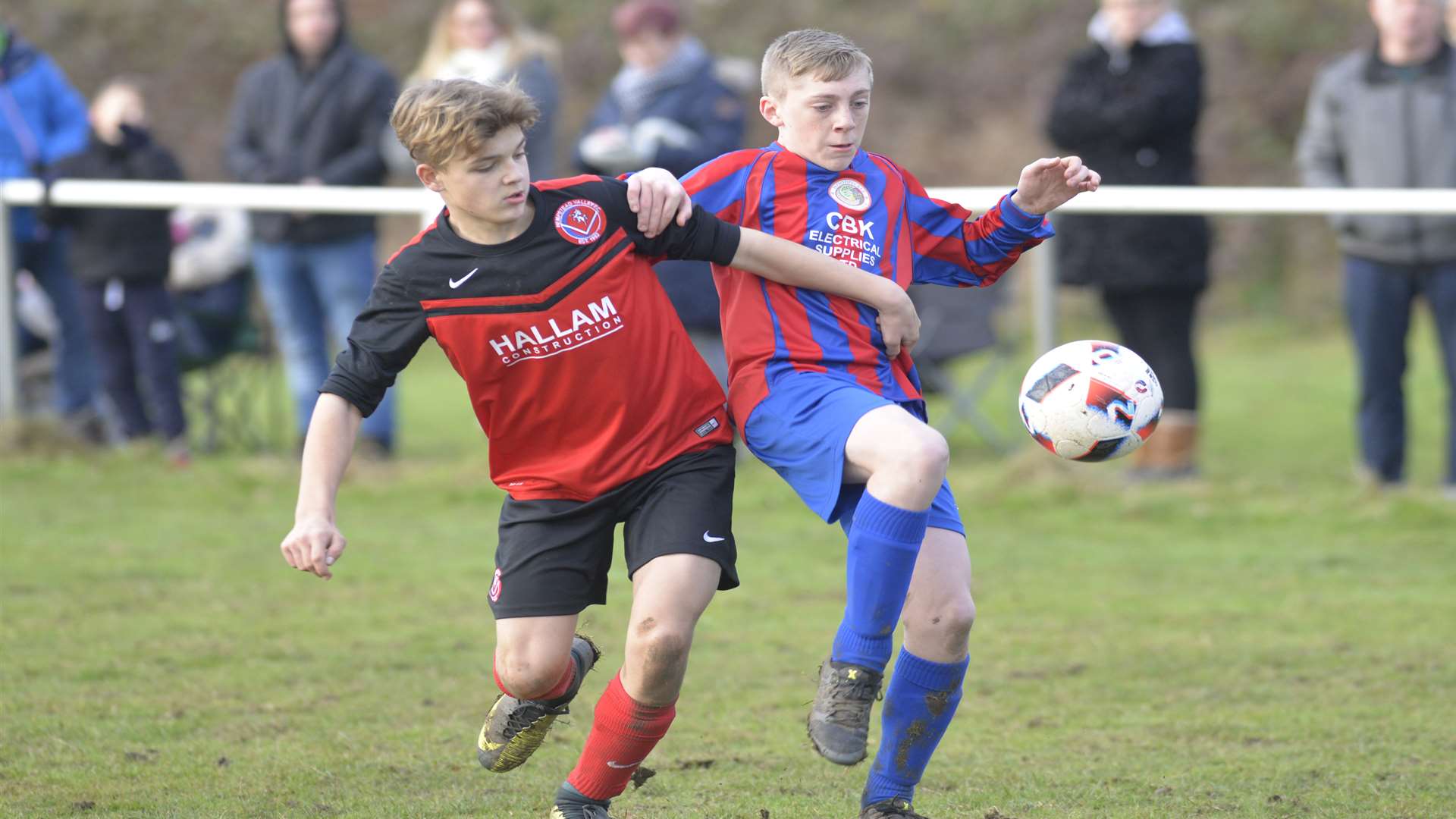 Hempstead Valley under-14s (red) take on Woodpecker HI United in the League Cup Picture: Ruth Cuerden