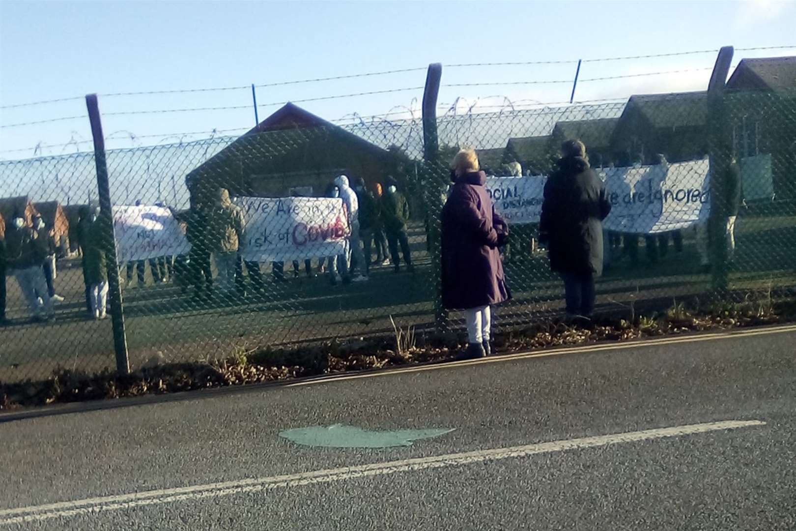 People seeking asylum protesting at Napier Barracks in December