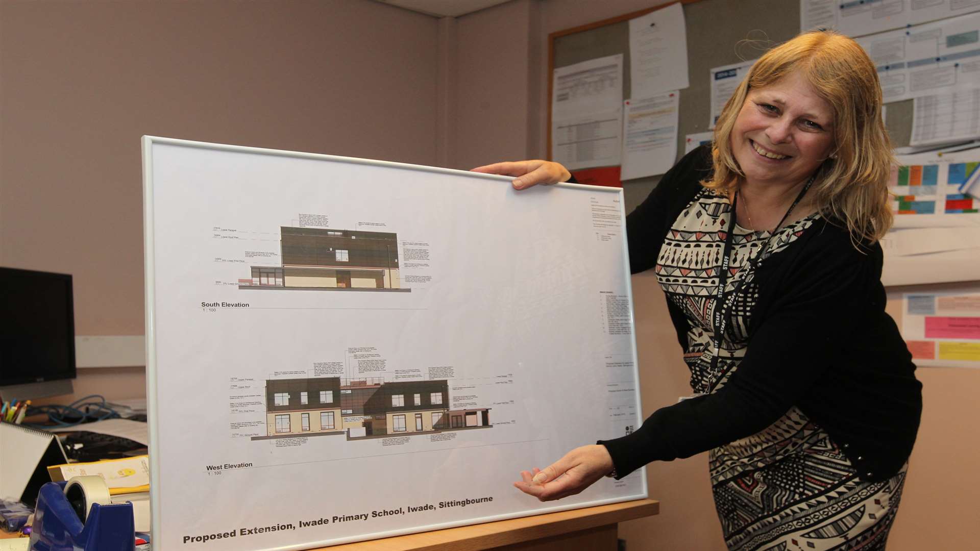 Caroline Mariner, head of school, with plans of the new extension