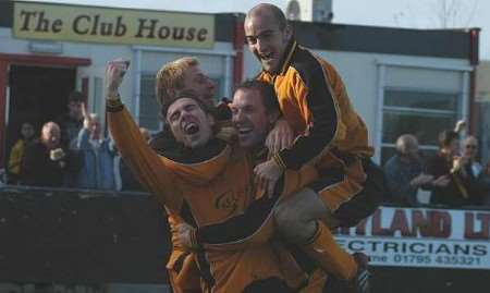 SHEER JOY: Simon Austin, front left, being congratulated by Martin Buglione, Jimmy Strouts and Richard Sinden after scoring on Saturday. Picture: MIKE SMITH