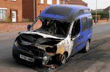 Burnt-out Fiat Doblo people carrier in Medway Road, Sheerness after arson attack
