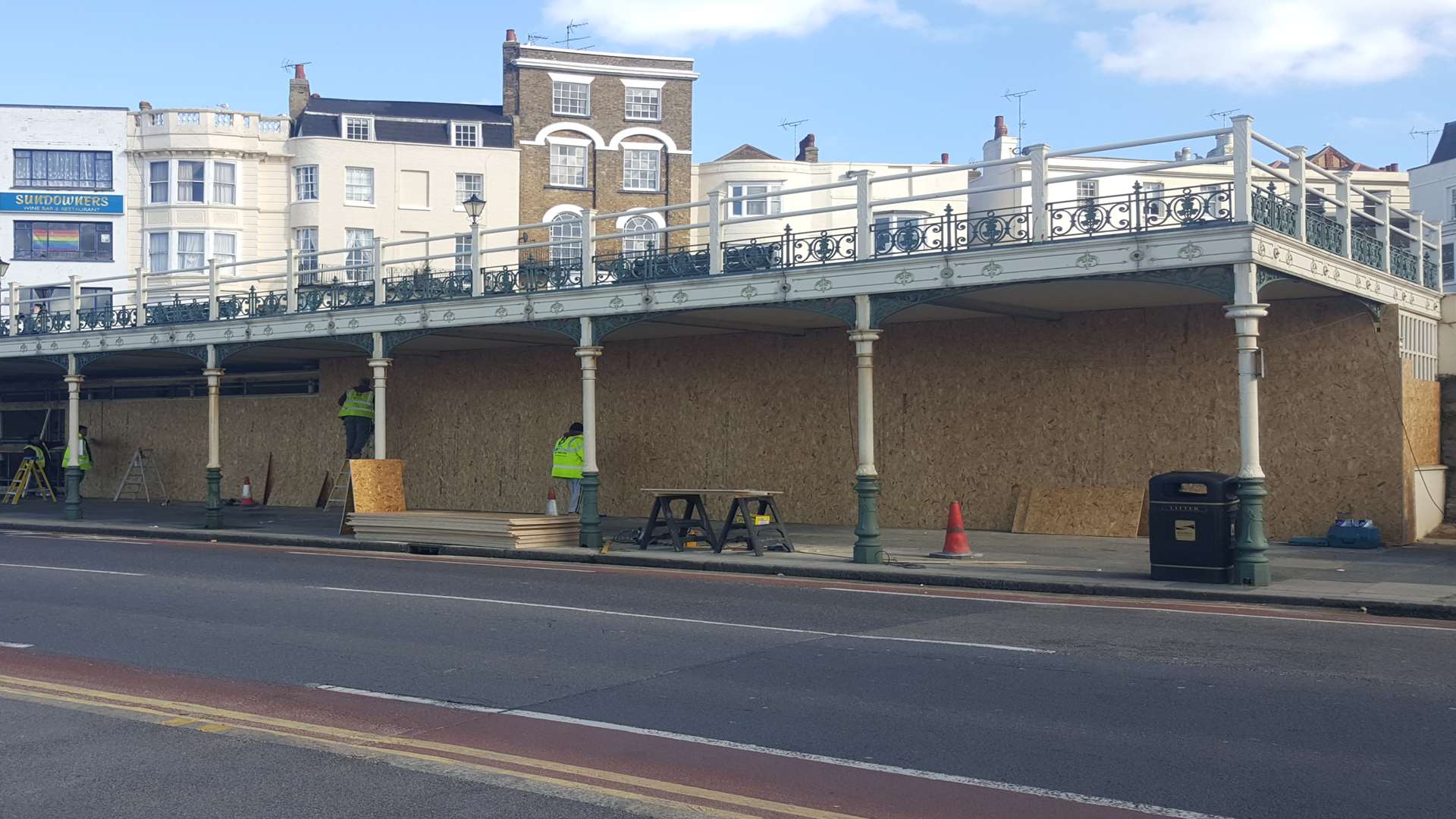 Workmen have been seen boarding up the Victorian shelter