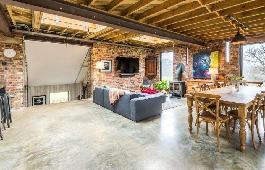 The rooms feature exposed brick walls and concrete floors. Picture: Knight Frank