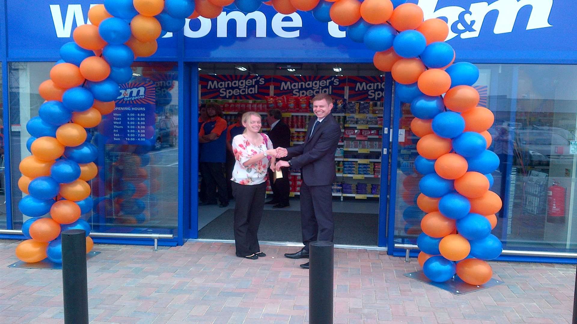 Local hero Kelly Strudwick with manager Adam Lofthouse at the new B&M Bargains store in Neats Court, Queenborough