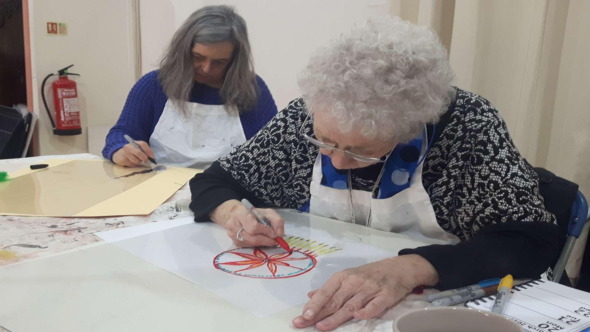 Members of the Gravesend Art group working on their current project.