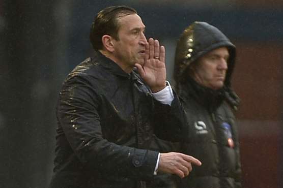 Gills boss Justin Edinburgh on the Boundary Park touchline Picture: Barry Goodwin