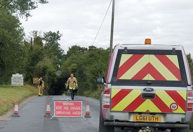 Emergency services have shut both ends of Blackbox Hill. Photo: Ben Barton Gibson