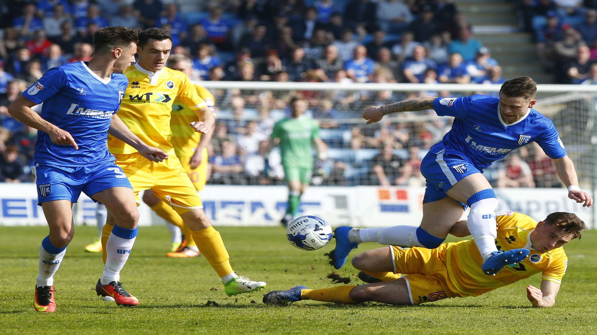 Gillingham's Mark Byrne gets stuck in Picture: Andy Jones