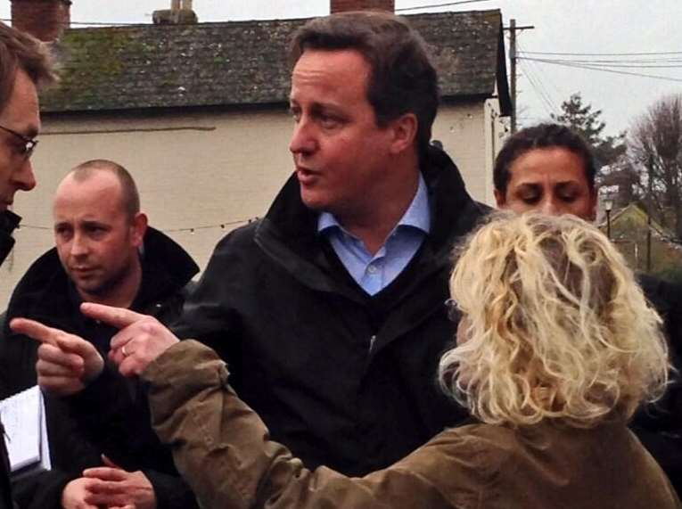 David Cameron meets Yalding villagers during a visit to flood-hit sites
