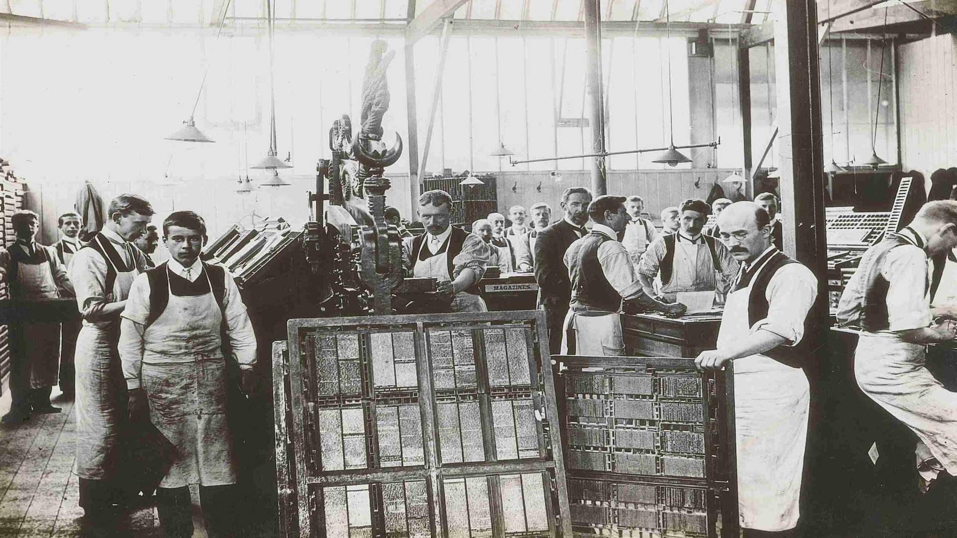 Compositors at work in the Headley Brothers print shop in the early 20th century