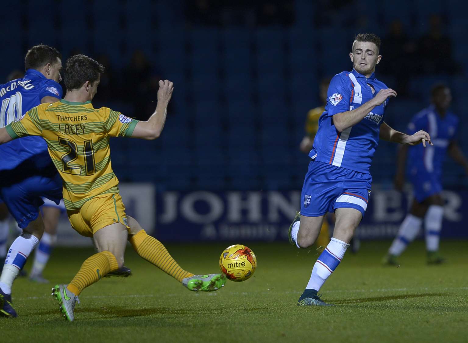 Alex Lacey battles for the ball against Gillingham Picture: Barry Goodwin