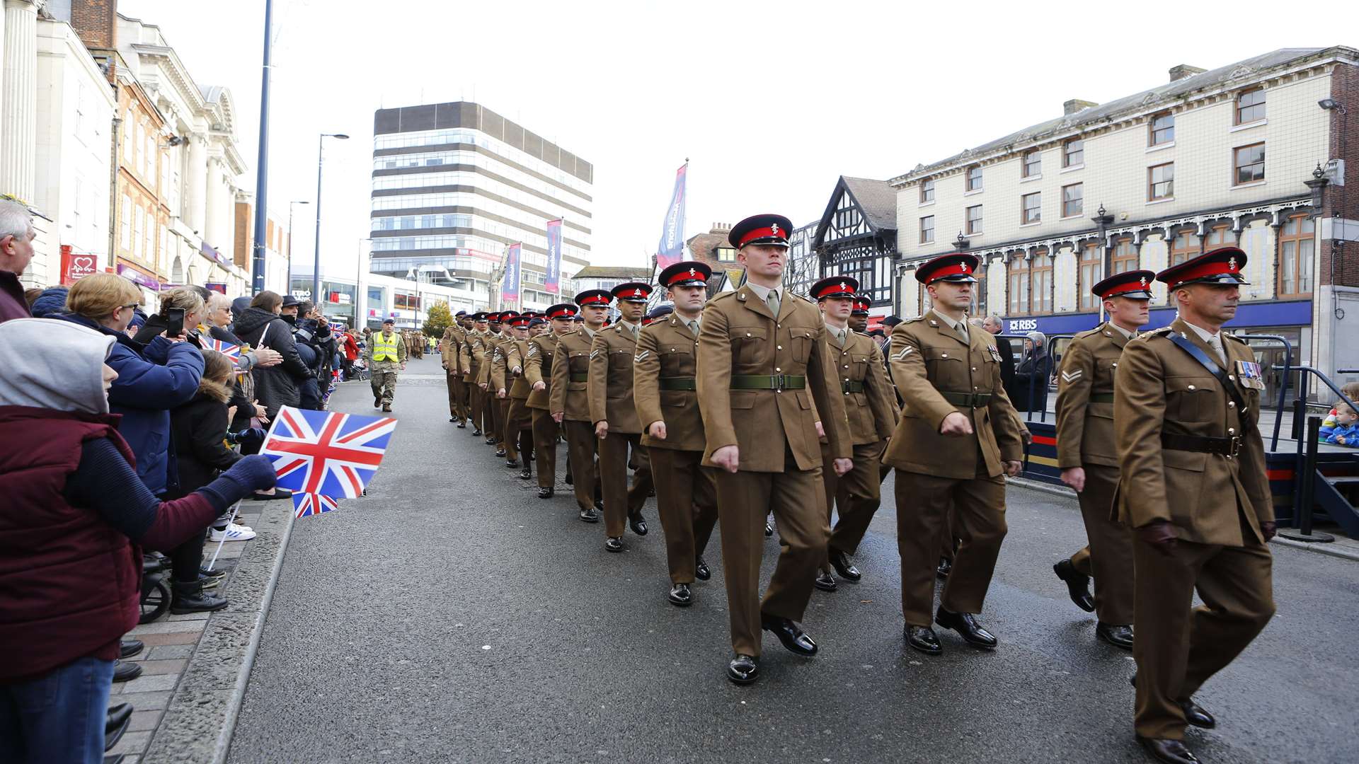 The Remembrance parade passes Maidstone Town Hall