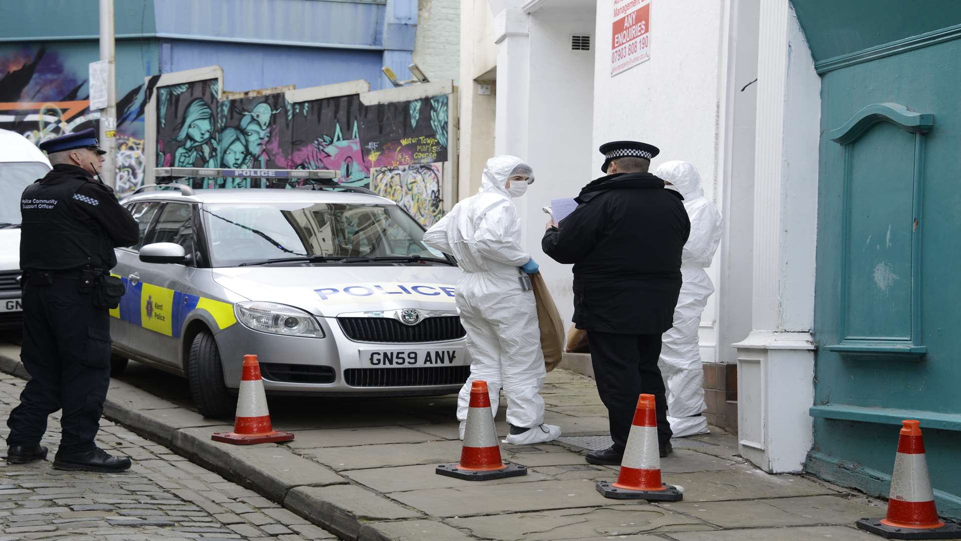 Police investigating the incident at Folkestone's Old High Street.