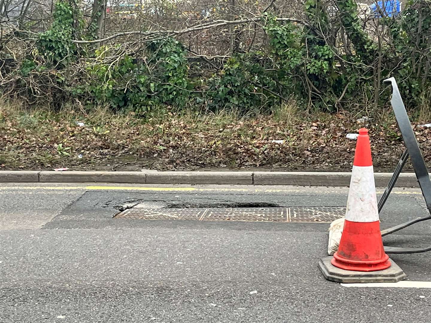 The collapsed manhole on Chart Road