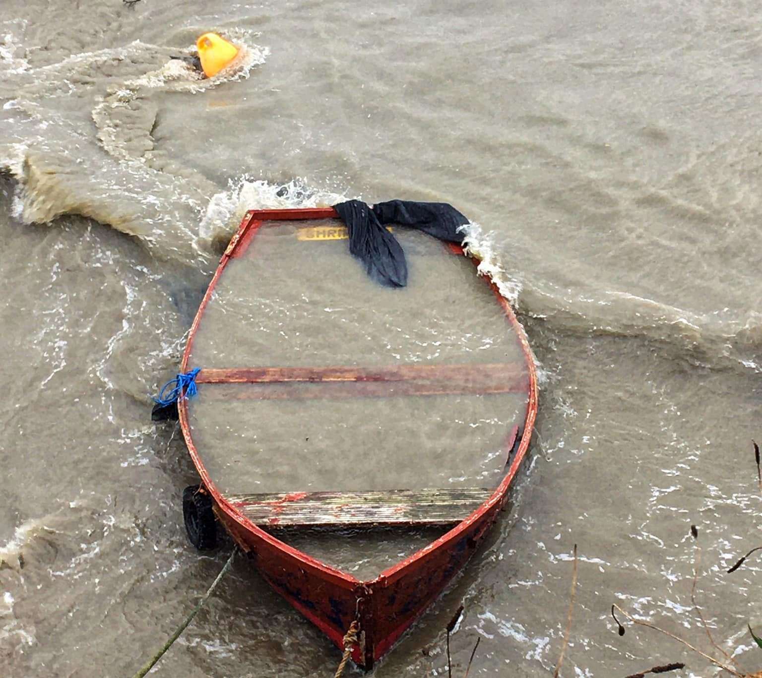Some boats at Folkestone Harbour have been almost completely submerged. Picture: David Illsley