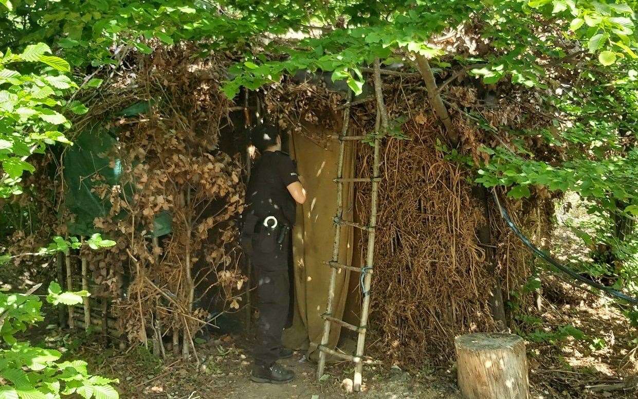 Photos show what appears to be a home-made ladder resting against a makeshift hut. Picture: Kent Police