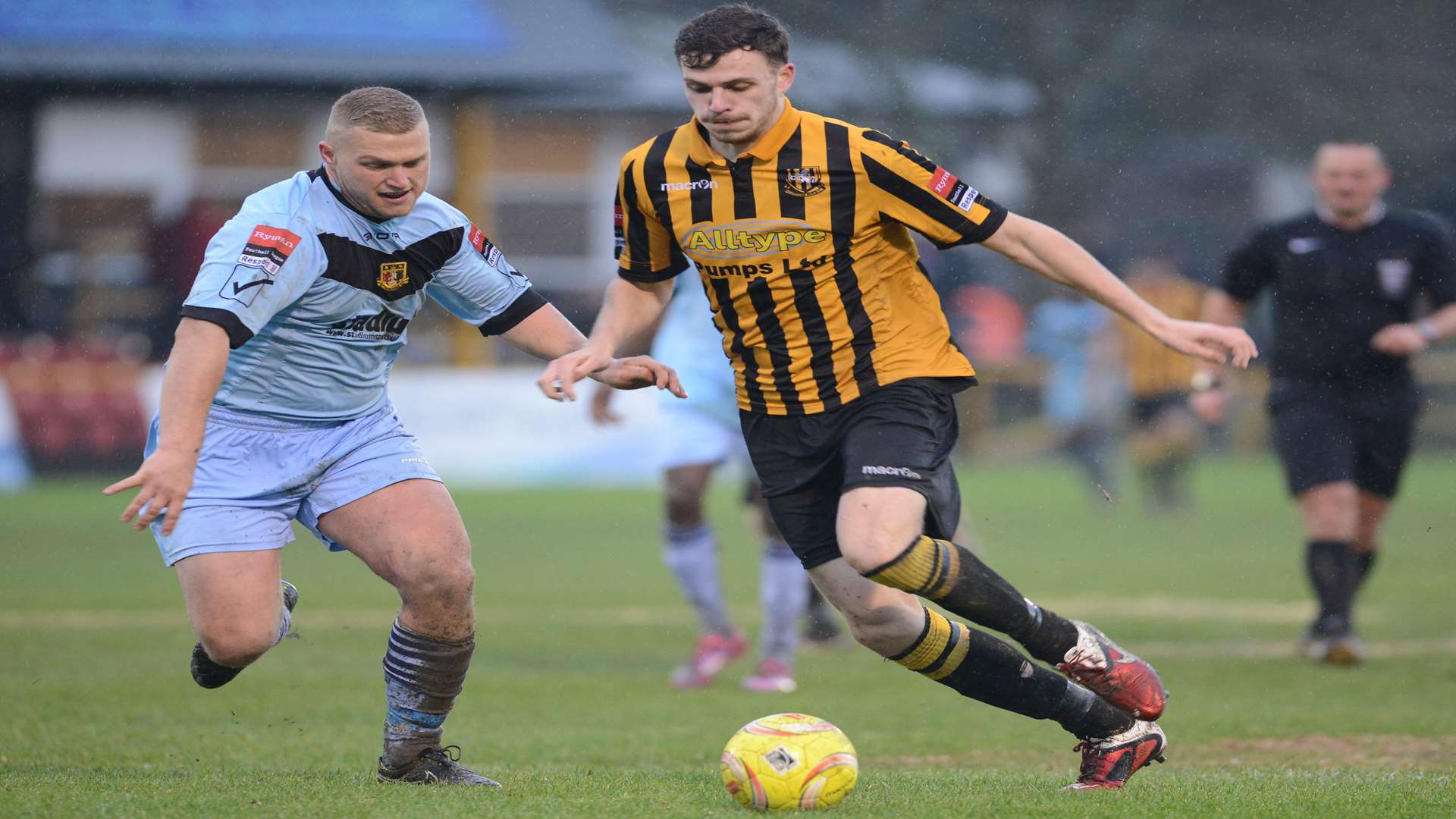 Folkestone's Harry Smith in action against his former club, Sittingbourne. Picture: Gary Browne