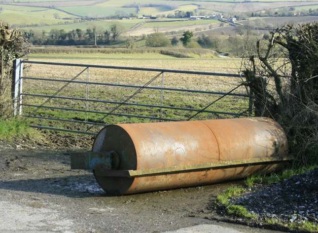 One of the rollers dragged across the road was large, designed to be pulled behind horses.