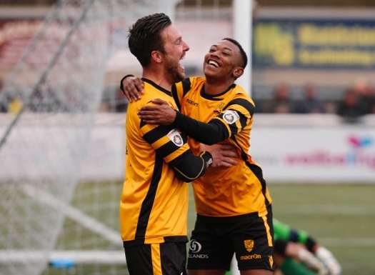 Jamie Coyle celebrates his goal with Charles Banya Picture: Matthew Walker