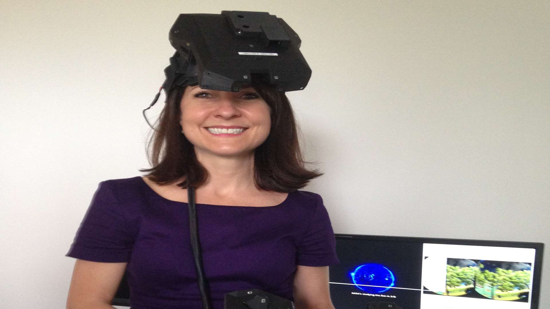 Liz Kendall trying out the simulator at Dovetail Games