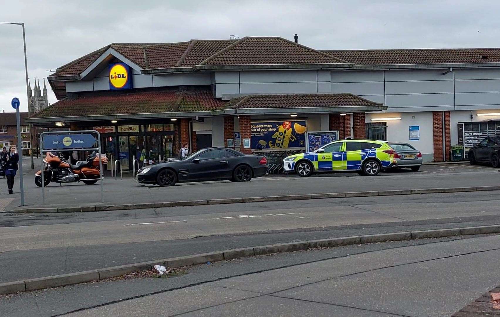 Two police cars were seen outside the store in New Street