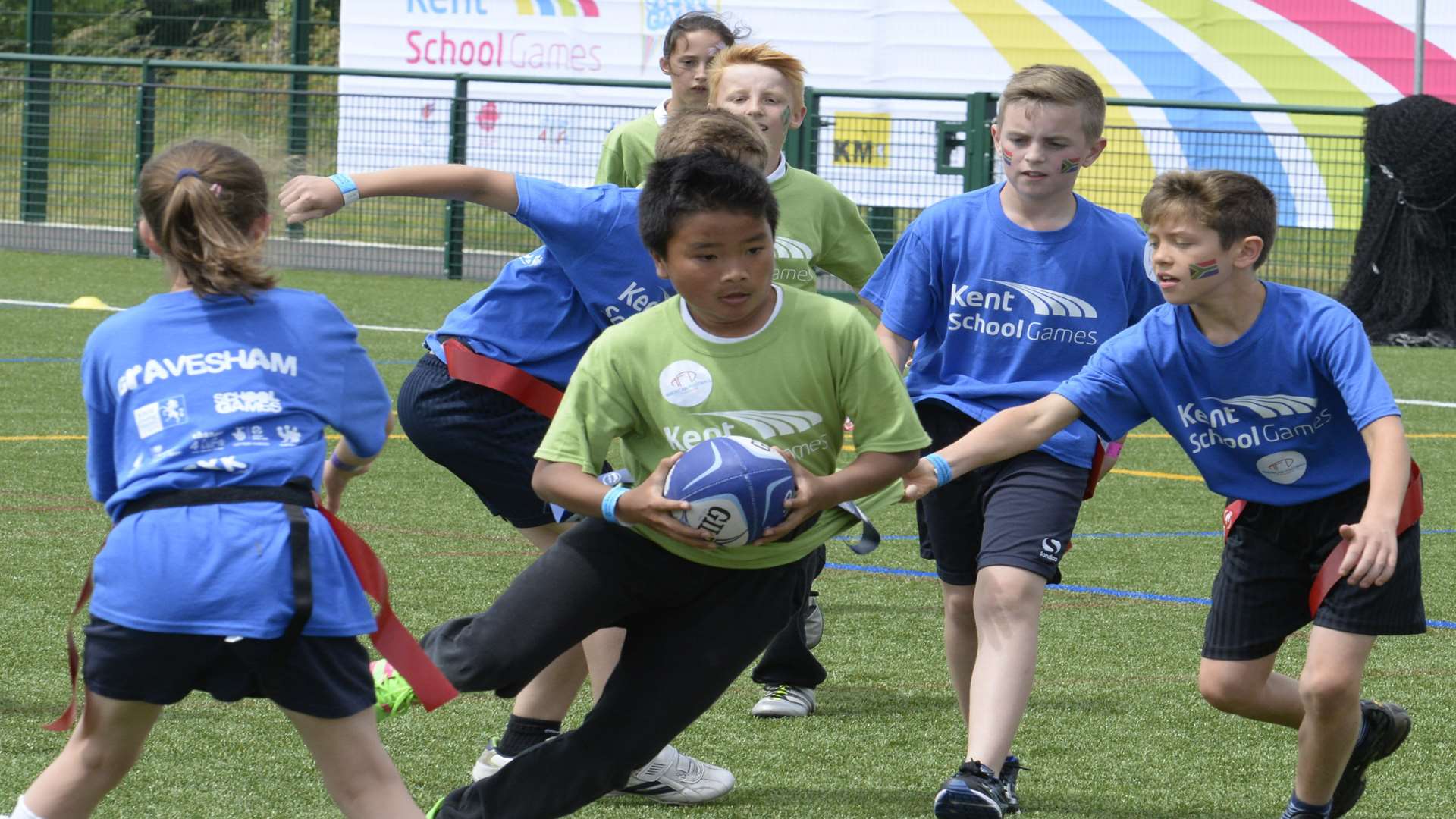 Tag rugby action between Aylesford Primary, in green, and Vigo Primary Picture: Chris Davey