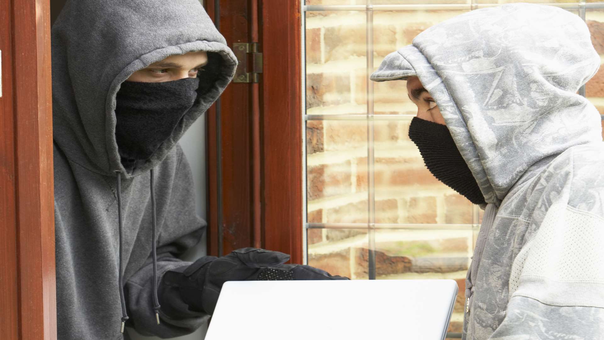 burglars stole cars, a laptop and jewellery.