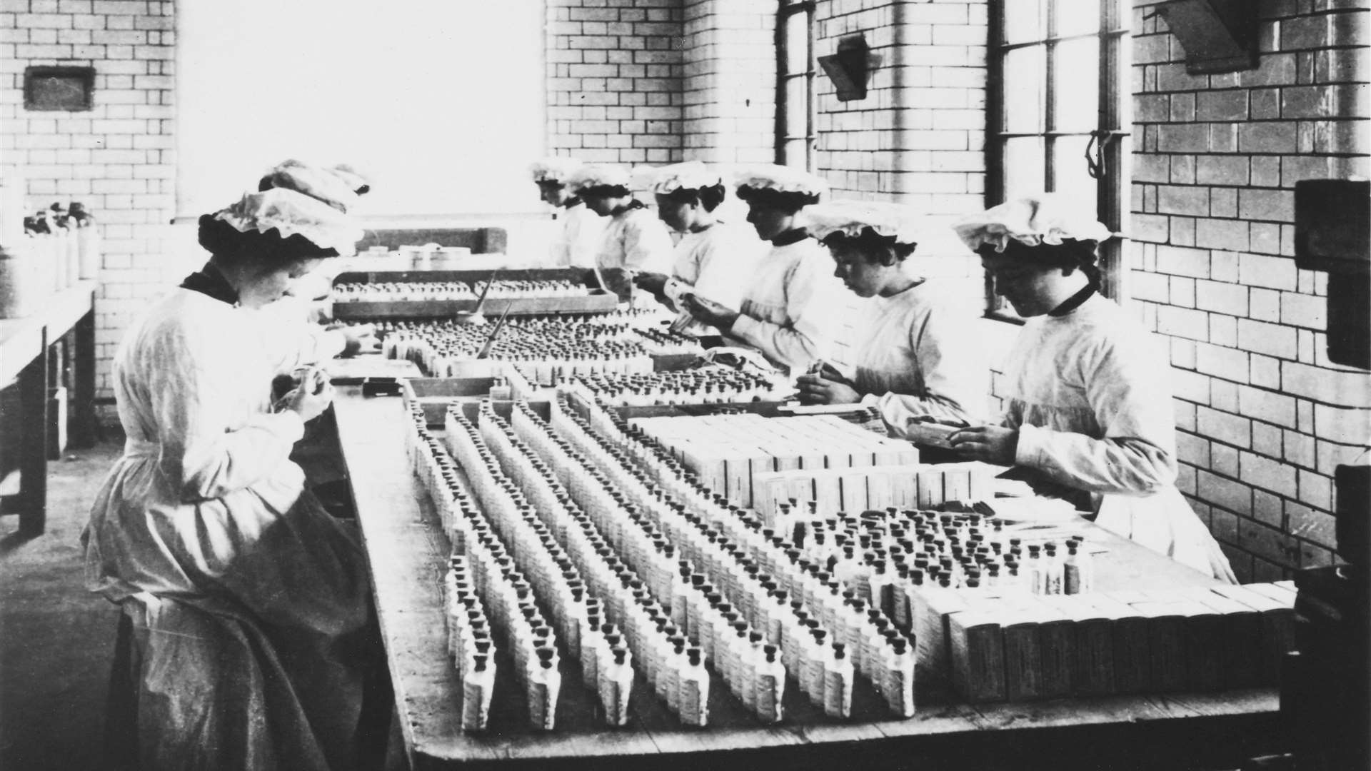 Female workers on the packing floor of the Wellcome factory at Mill Pond in Dartford.