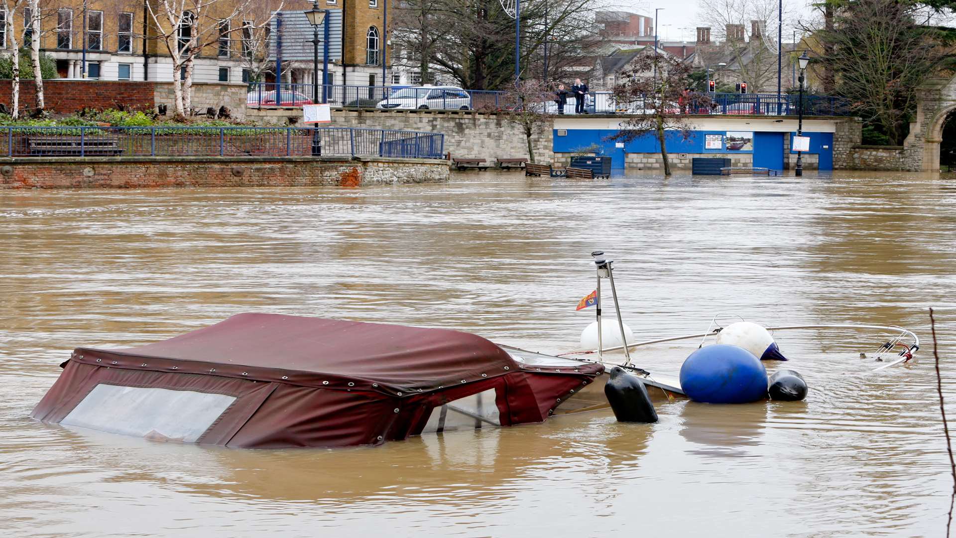 A submerged boat on the swollen River Medway