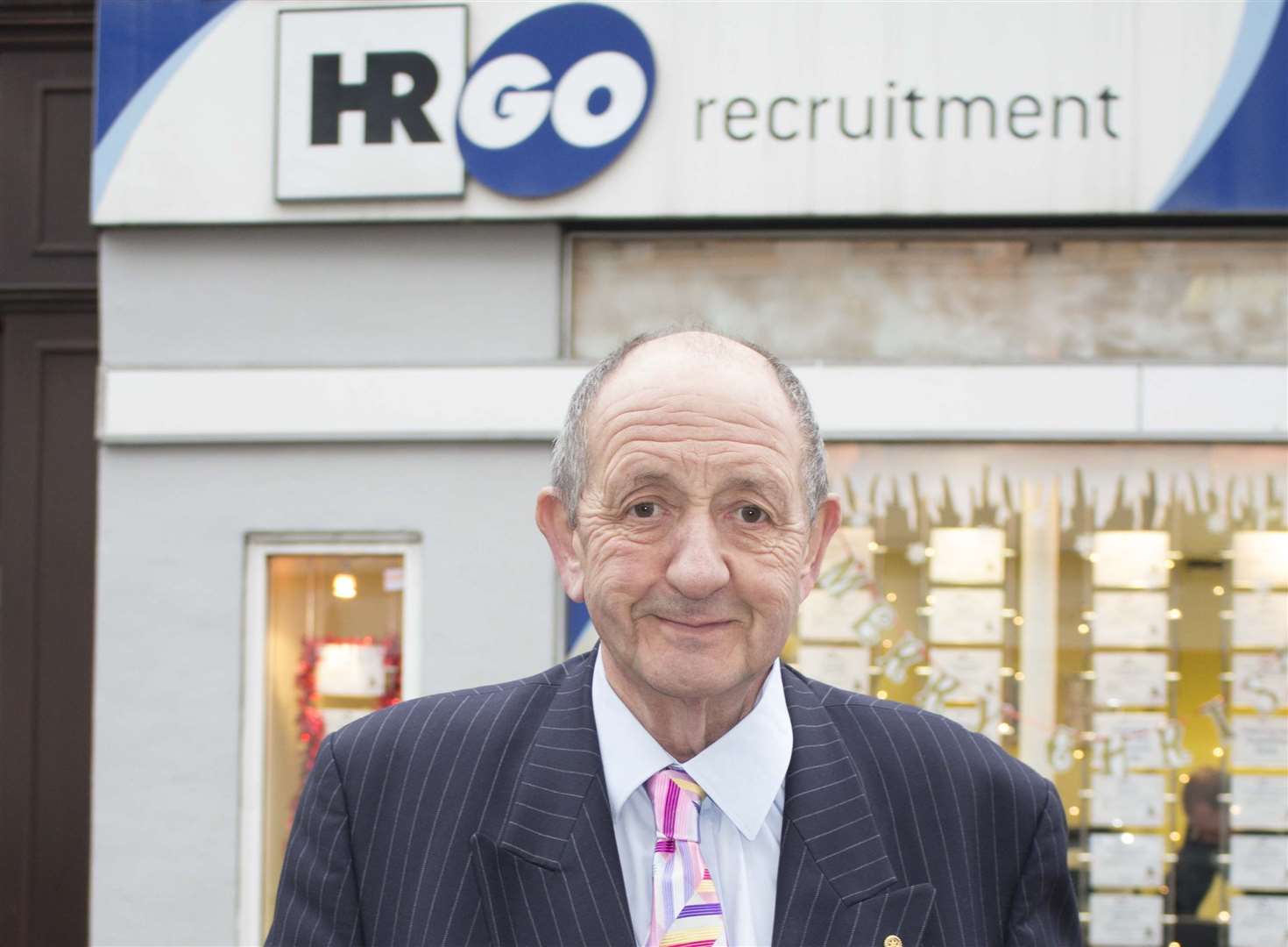 Jack Parkinson, pictured in 2017, outside the branch in Dartford first opened by his mother