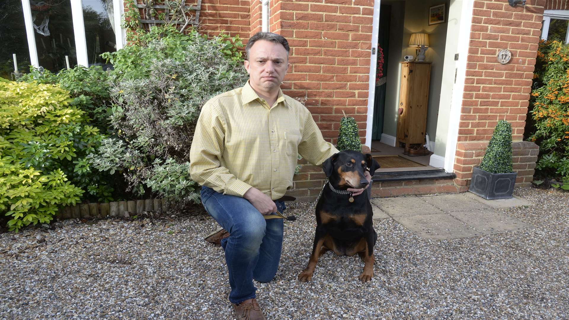 Michael Johnson with his dog Zara at home in Chestfield