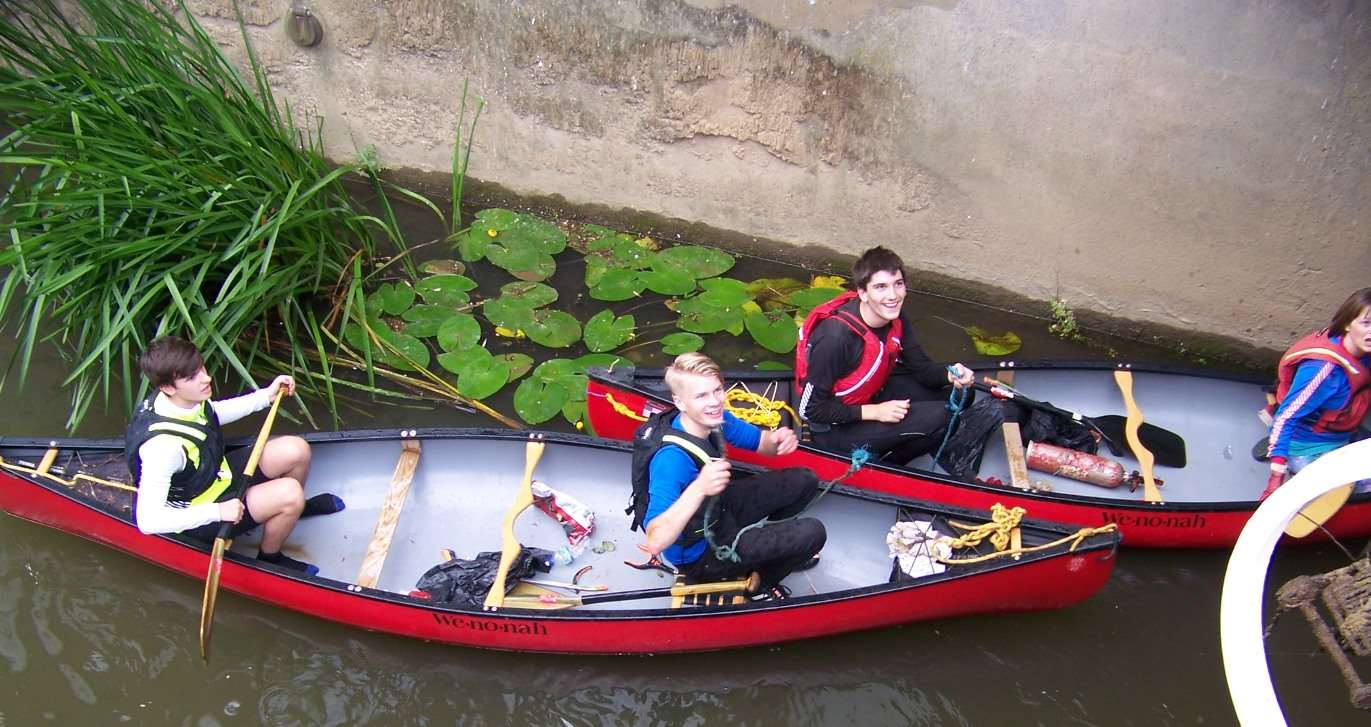Ten canoeists helped clear the river
