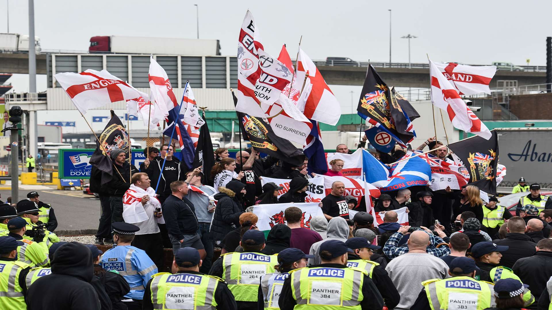 Far right protesters wave flags during the rally weeks ago